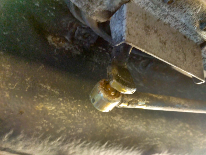 I couldn’t get this loose. Yes, there’s WD40 in there. This connects directly to the shifter.